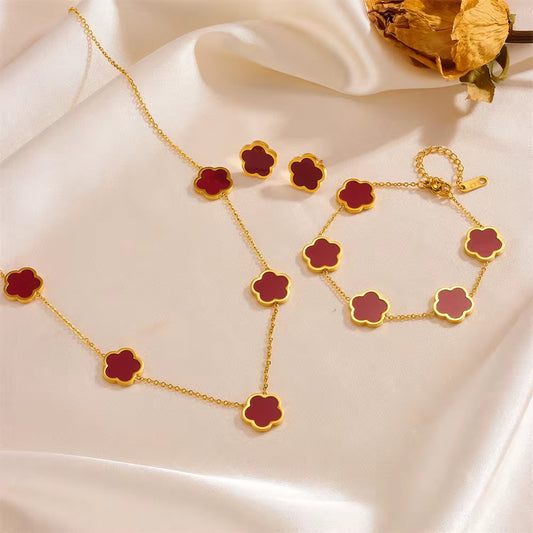 Parure trèfle rouge femme – Collier, bracelet et boucles en acier doré
