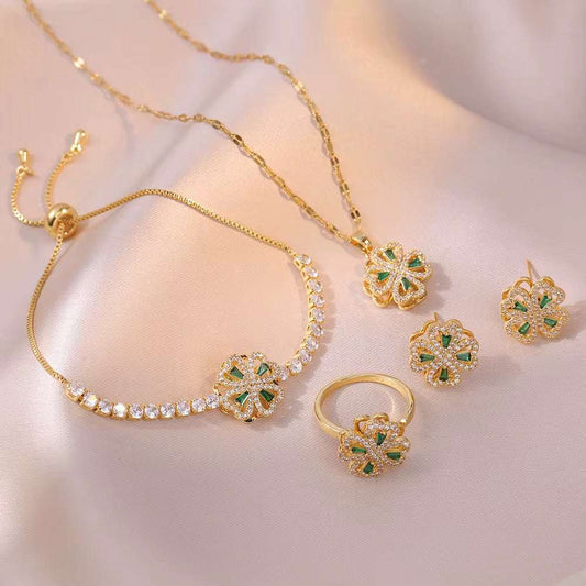 Parure fleurs dorée en acier, collier, boucles et bague ornés de fleurs vertes et de cristaux brillants