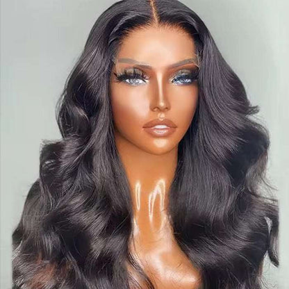 perruque Body Wave noire en cheveux humains, longues ondulations souples et raie centrale naturelle