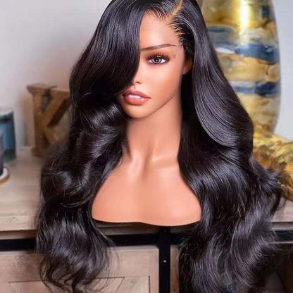 Perruque Loose Wave noire en cheveux humains, longue et brillante, avec ondulations souples et raie latérale