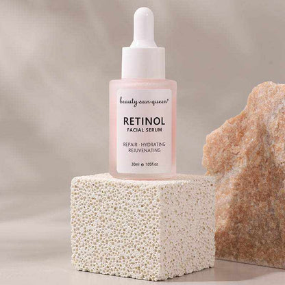 Sérum visage au rétinol dans un flacon compte-gouttes rose pâle, marqué rétinol et 30 ml