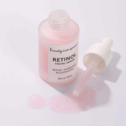 Sérum visage au rétinol rose dans un flacon en verre avec pipette blanche et texture déposée